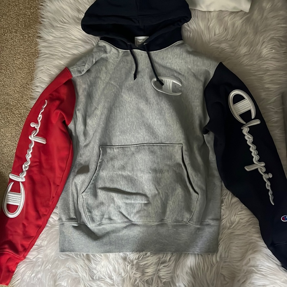 Red,White,Blue, and Grey champion hoodie
